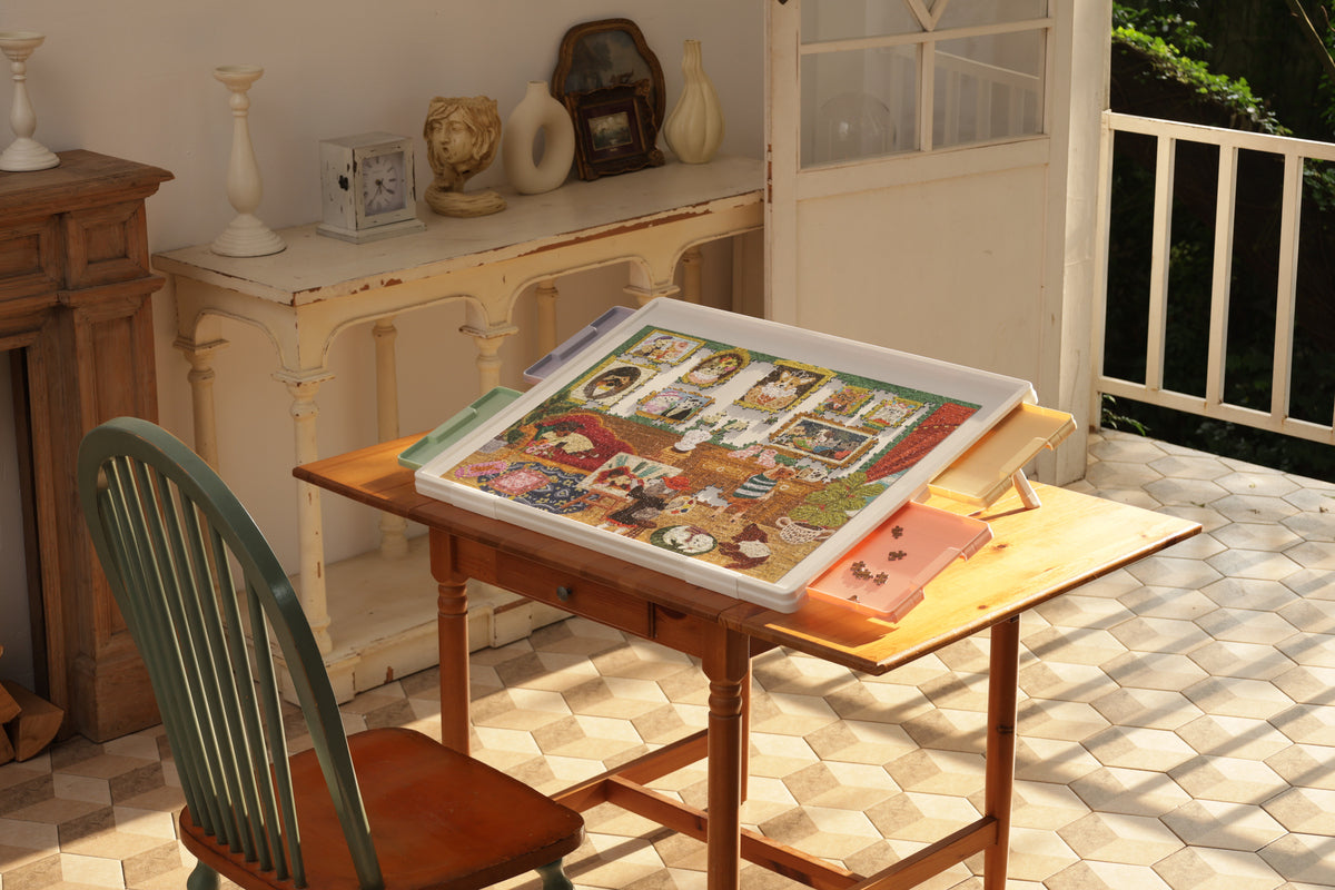 Lifestyle photo of jigsaw puzzle table with colorful storage trays in home decor environment
