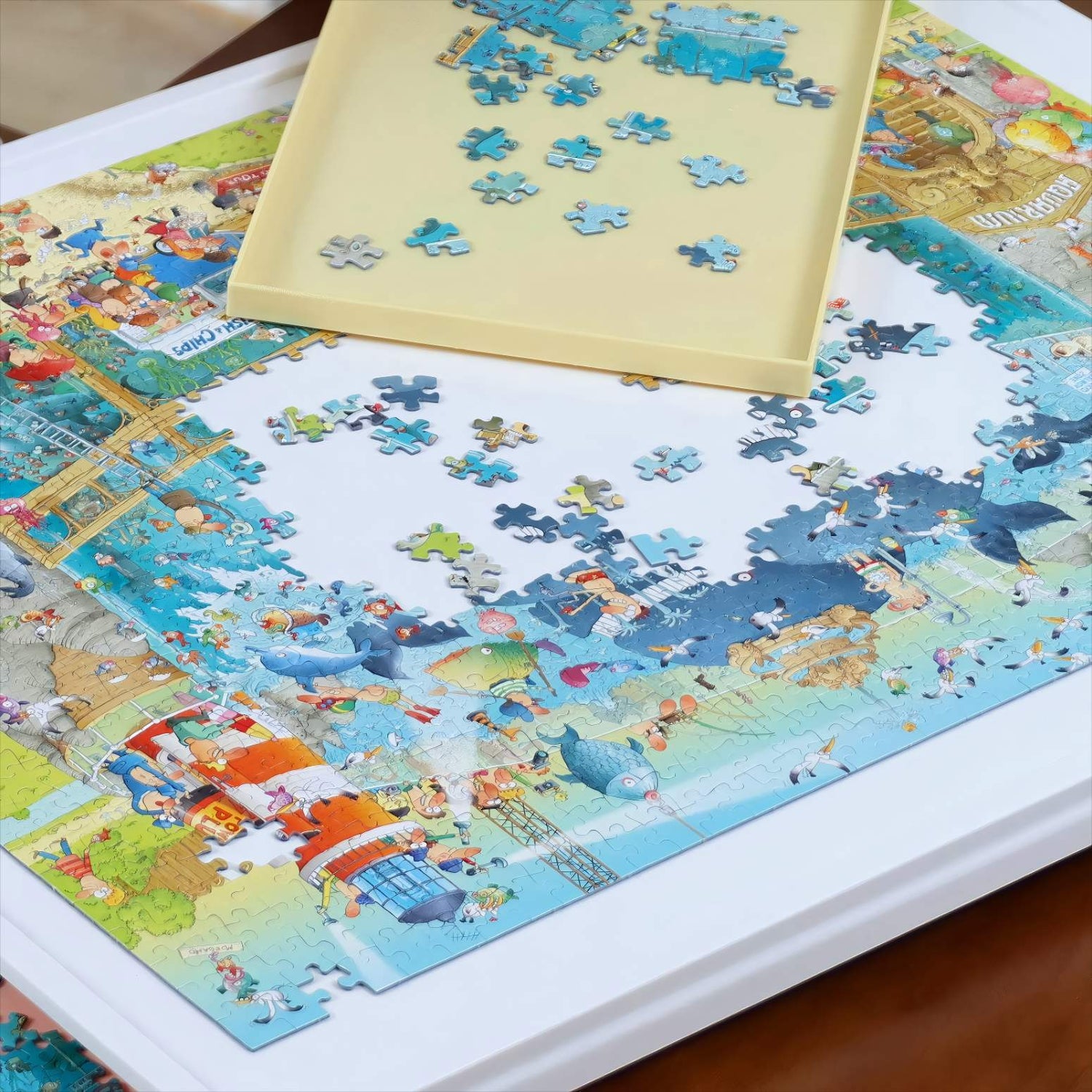 1000-piece whiteboard puzzle table with yellow sorting drawer, showing bright and spacious surface that makes each puzzle piece stand out