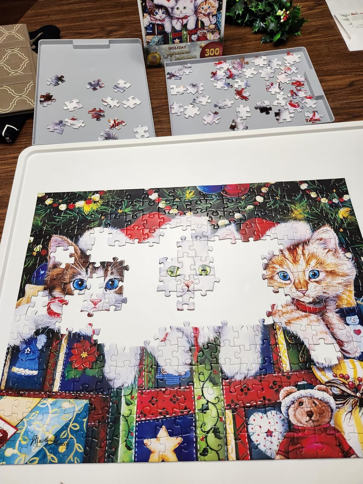 Customer review photo of Playboda whiteboard puzzle board with grey drawers and protective mat, featuring a cat-themed jigsaw in progress