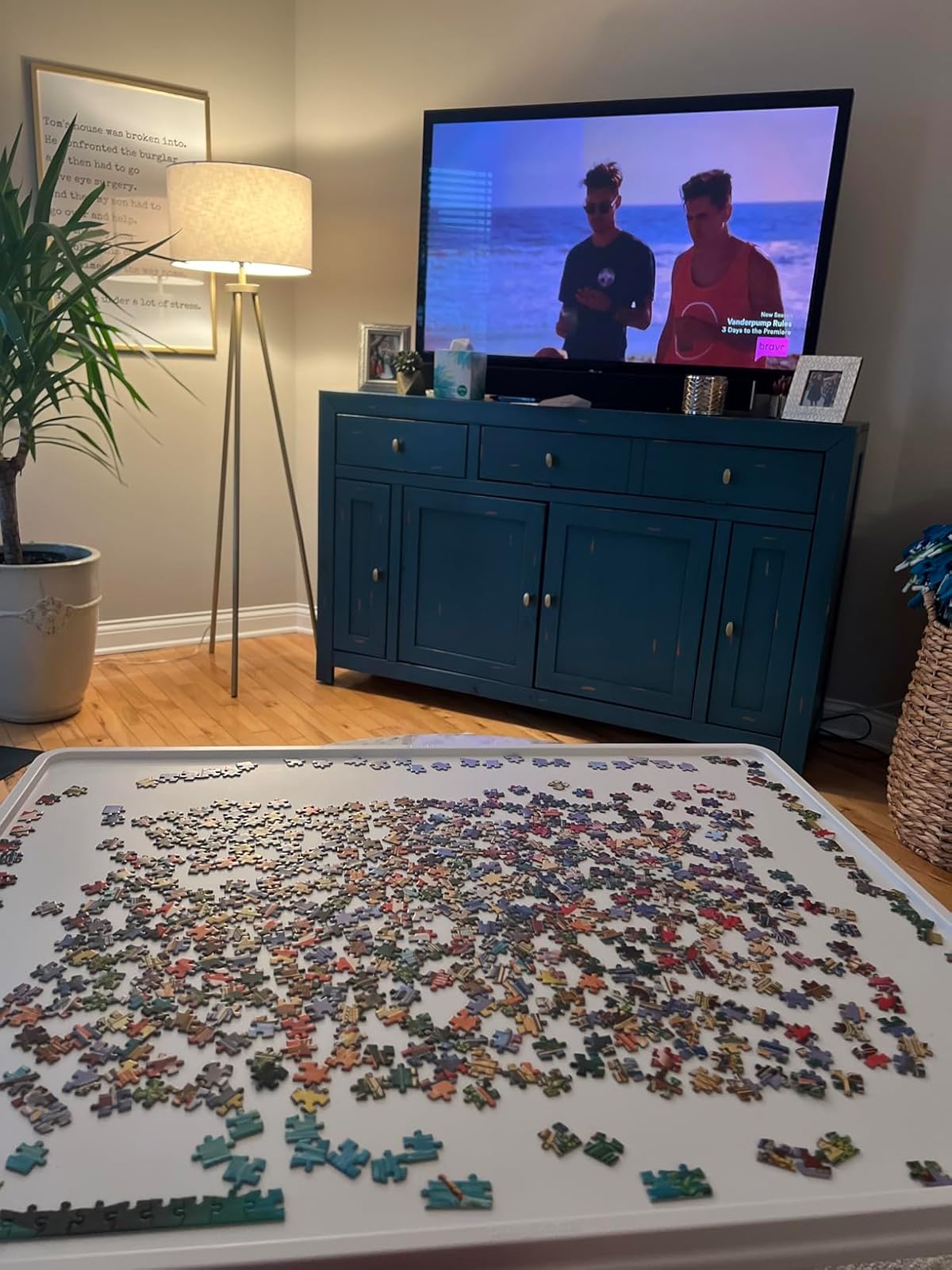 Customer review photo of Playboda whiteboard puzzle board with spinning function, in use in a cozy living room