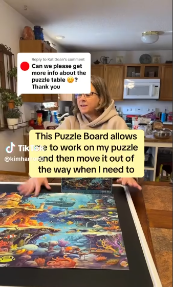 Customer showing completed puzzle on Playboda puzzle board, easy to move and store